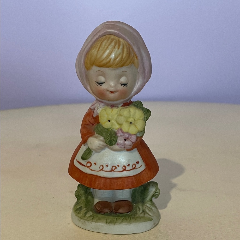 Charming girl Figurine with Flowers in hand